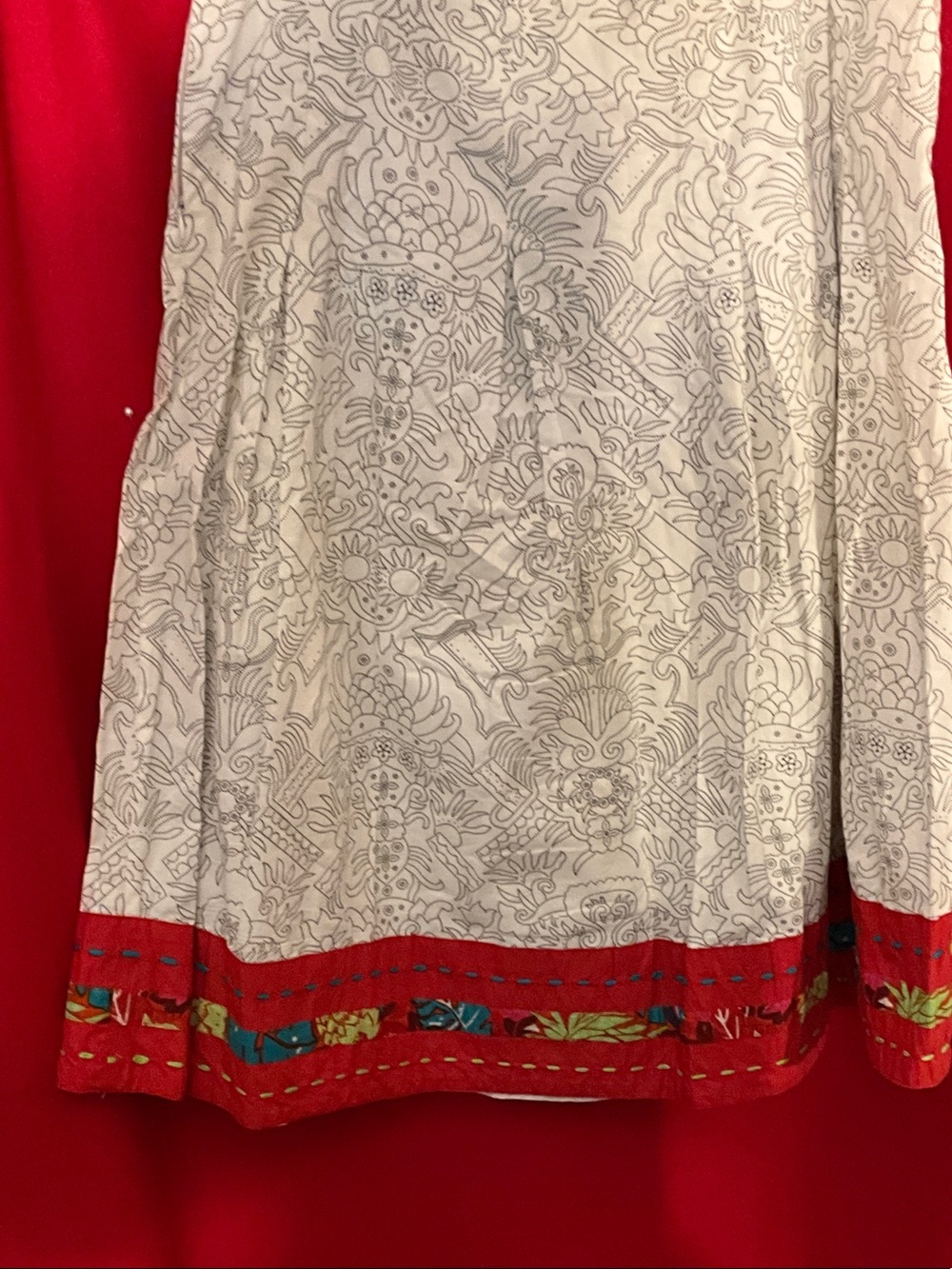 Handcrafted kantha skirt with red hem border